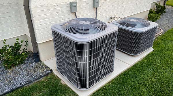 Image: Two Outdoor Condensers Sit Side By Side. Just An Fyi: The Best Rowland Heights Ac Service Is From Service Champions.